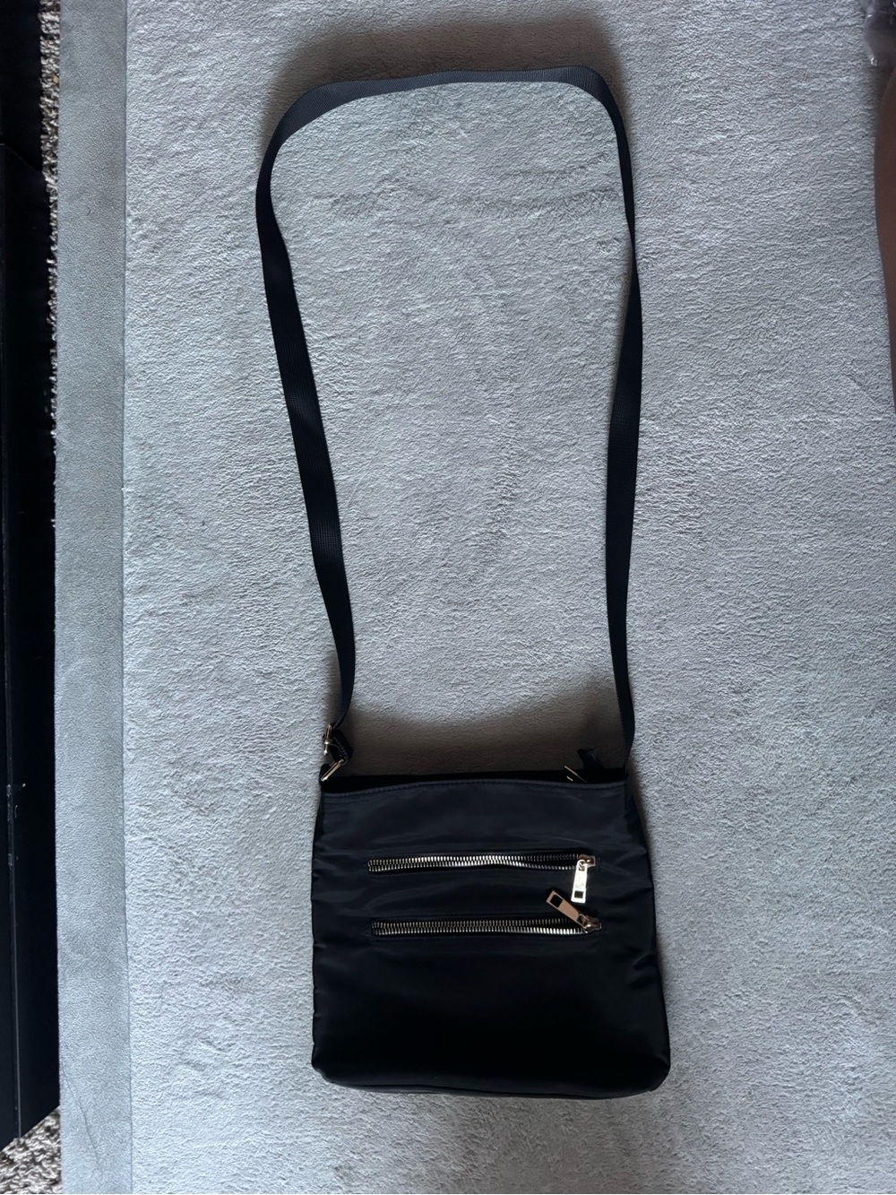 Compact Black Crossbody Bag with Front Zip Pockets
